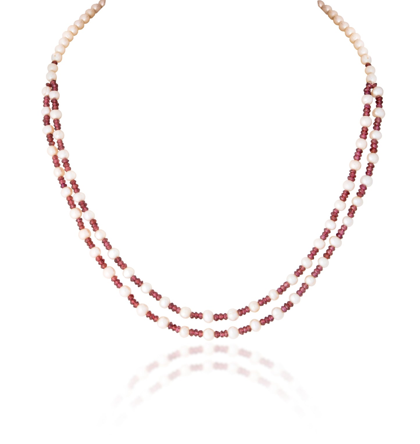 A STRAND OF INDIAN RUBY & CULTURED PEARL