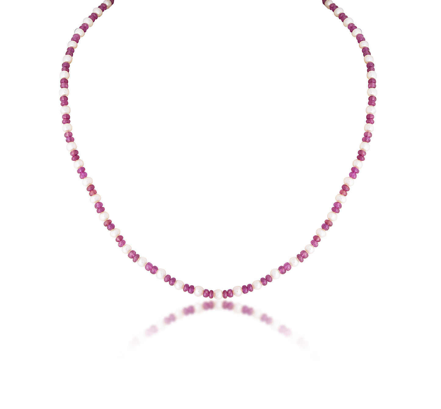 A SINGLE LINE STRAND OF RUBY WITH CULTURED PEARL