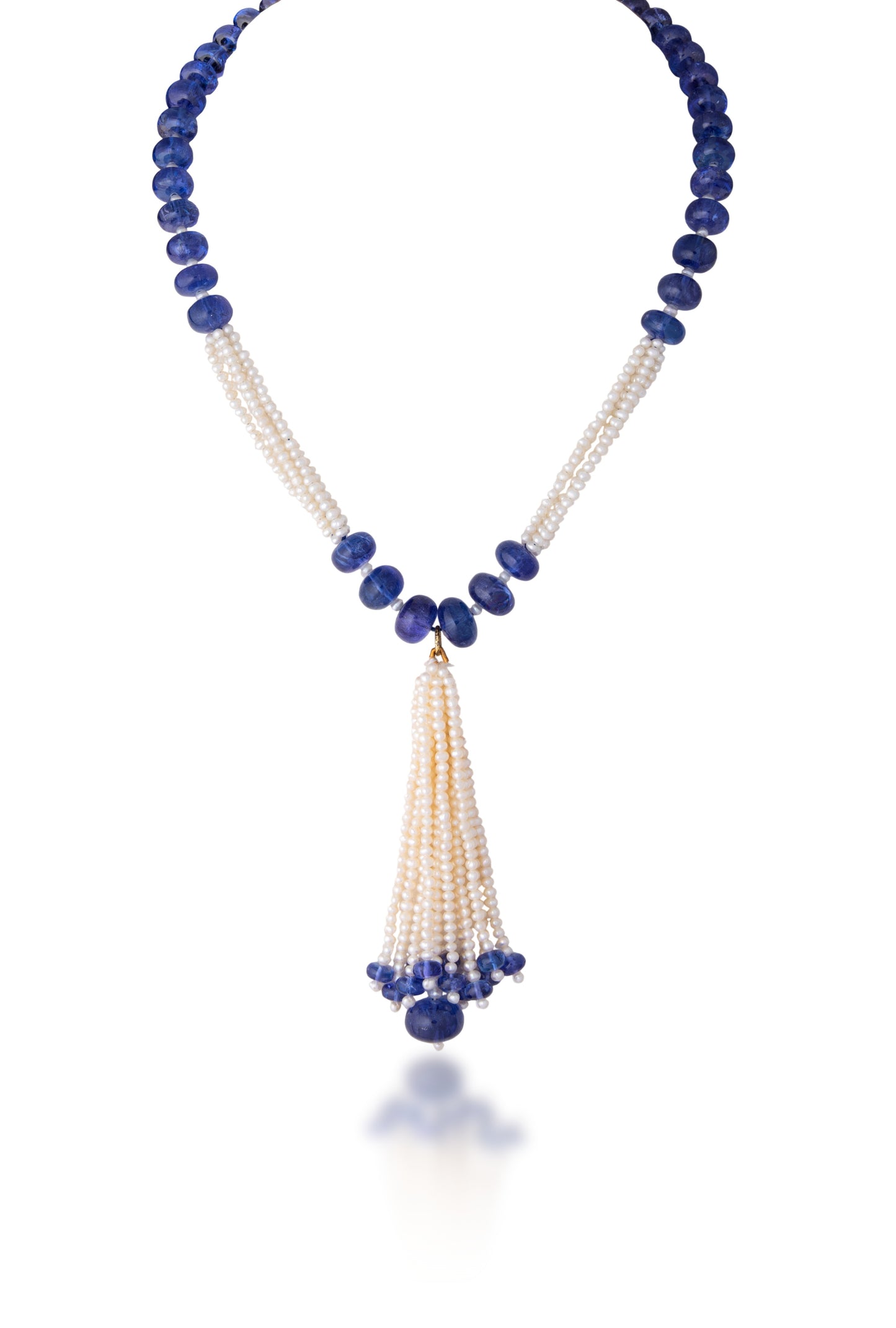 A TANZANITE STRAND CUSTOM CUT WITH CULTURED PEARL