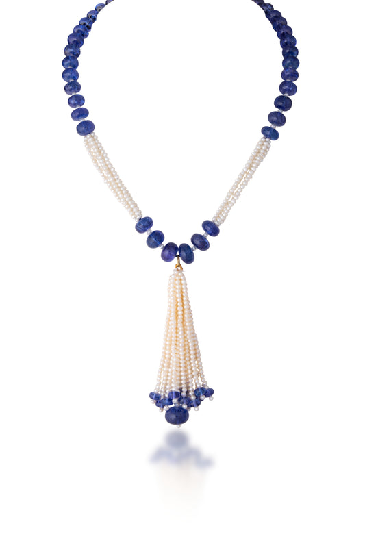 A TANZANITE STRAND CUSTOM CUT WITH CULTURED PEARL