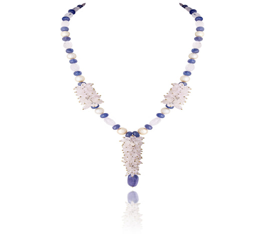 A STRAND OF MORGANITE CUSTOM CUT WITH TANZANITE