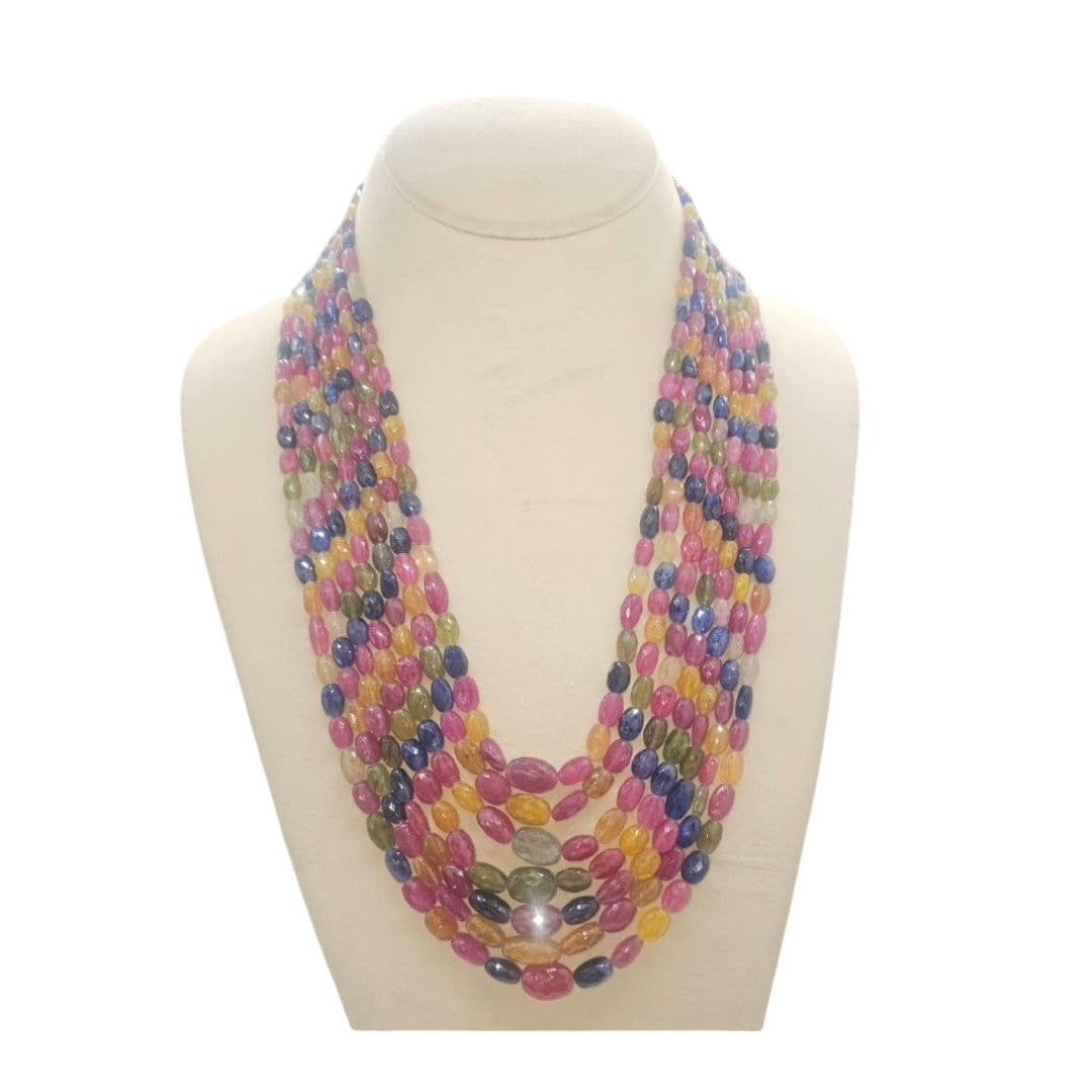 7 LINE MULTI SAPPHIRE WITH RUBY STRAND