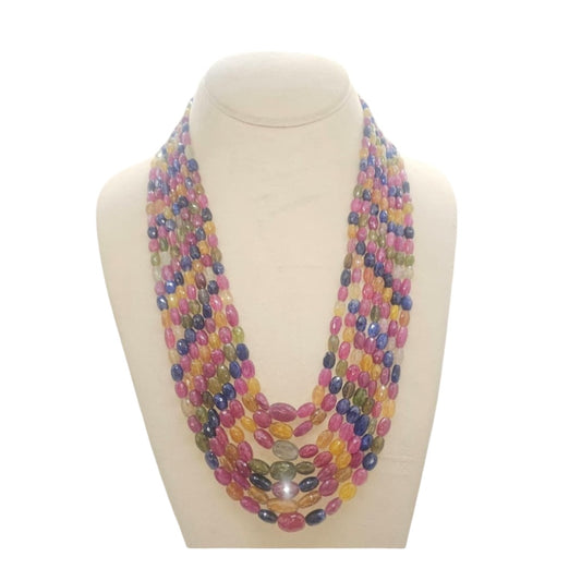 7 LINE MULTI SAPPHIRE WITH RUBY STRAND