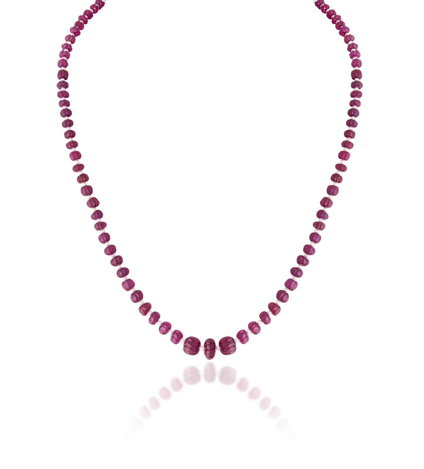 A STRAND OF INDIAN RUBY & PEARL