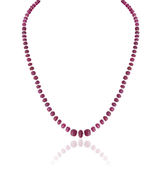 A STRAND OF INDIAN RUBY & PEARL