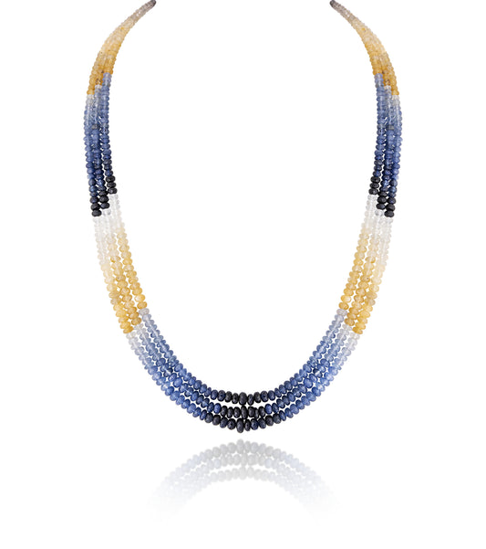A BLUE SAPPHIRE STRAND CUSTOM CUT WITH YELLOW SAPPHIRE