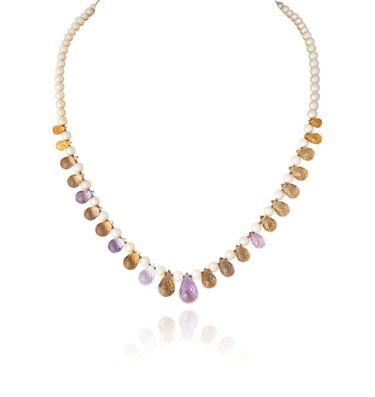 A STRAND OF CULTURED PEARL & MULTY AMYTHIST